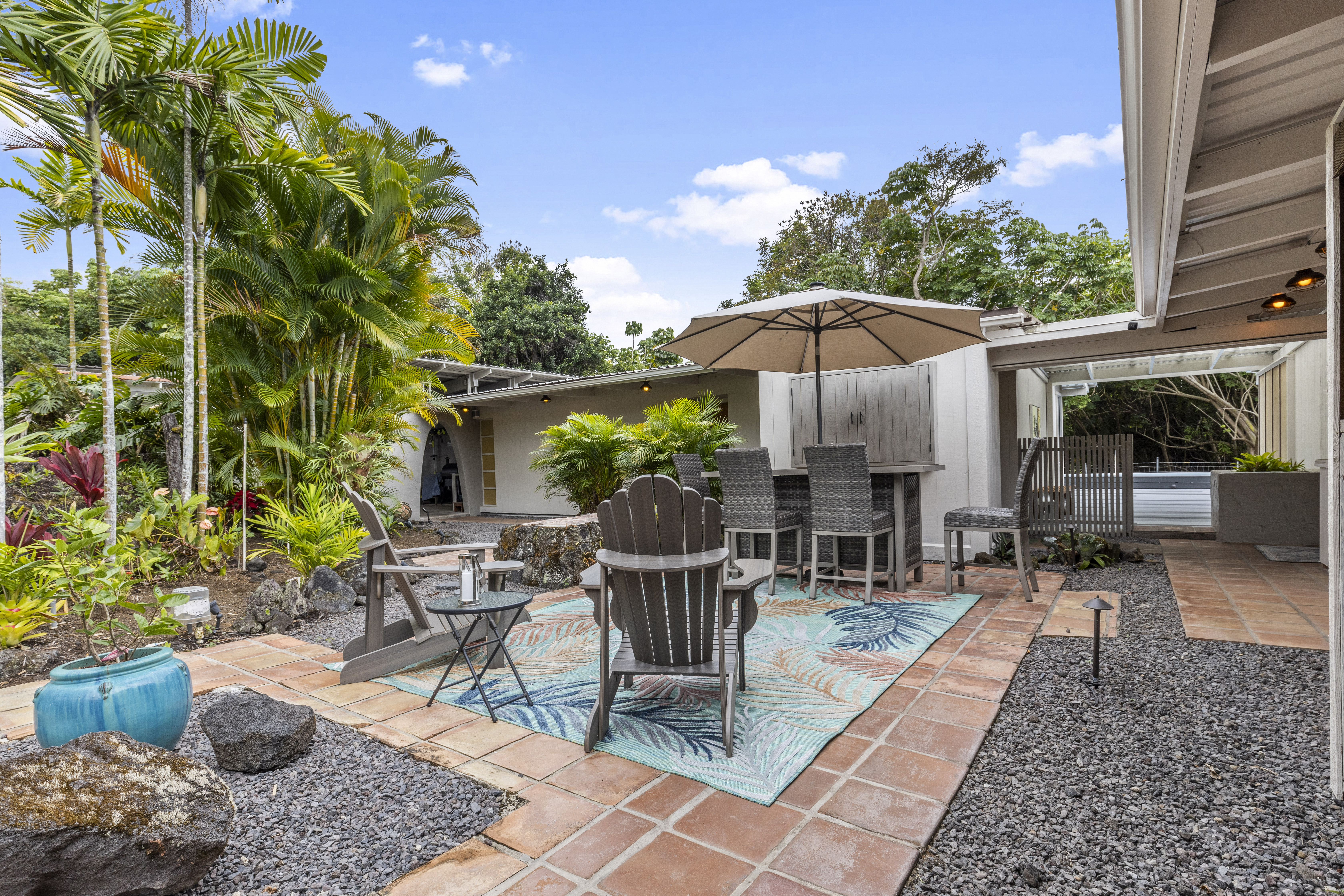 83-5369 Manako Road Captain Cook, HI 96704 - Photo 5 of 30 a patio with a table and chairs