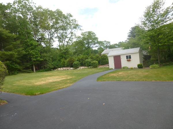 18 Phyllis Road Foxboro, MA 02035 - Photo 3 of 20 a view of a house with backyard and trees