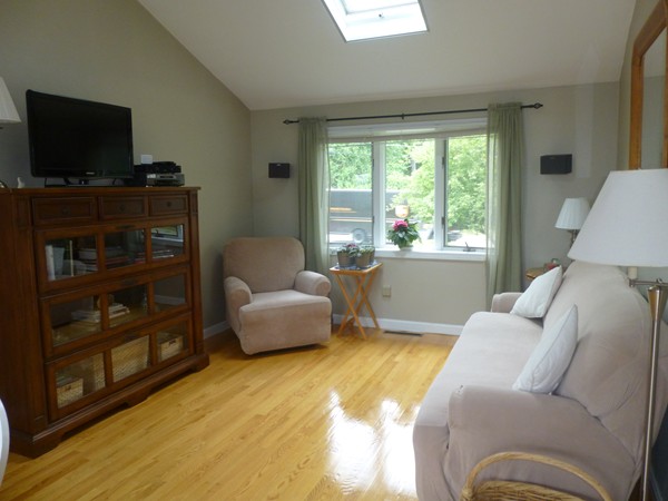 18 Phyllis Road Foxboro, MA 02035 - Photo 6 of 20 a living room with furniture and a flat screen tv