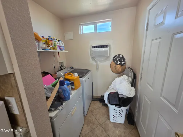 a bed room with a bed and a walk in closet