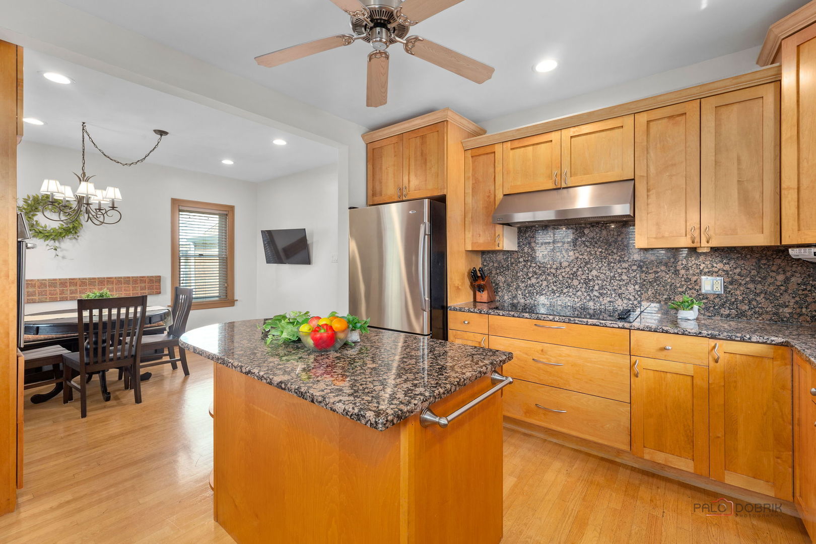 2720 Beulah Avenue River Grove, IL 60171 - Photo 11 of 33 a kitchen with stainless steel appliances granite countertop a sink refrigerator and cabinets