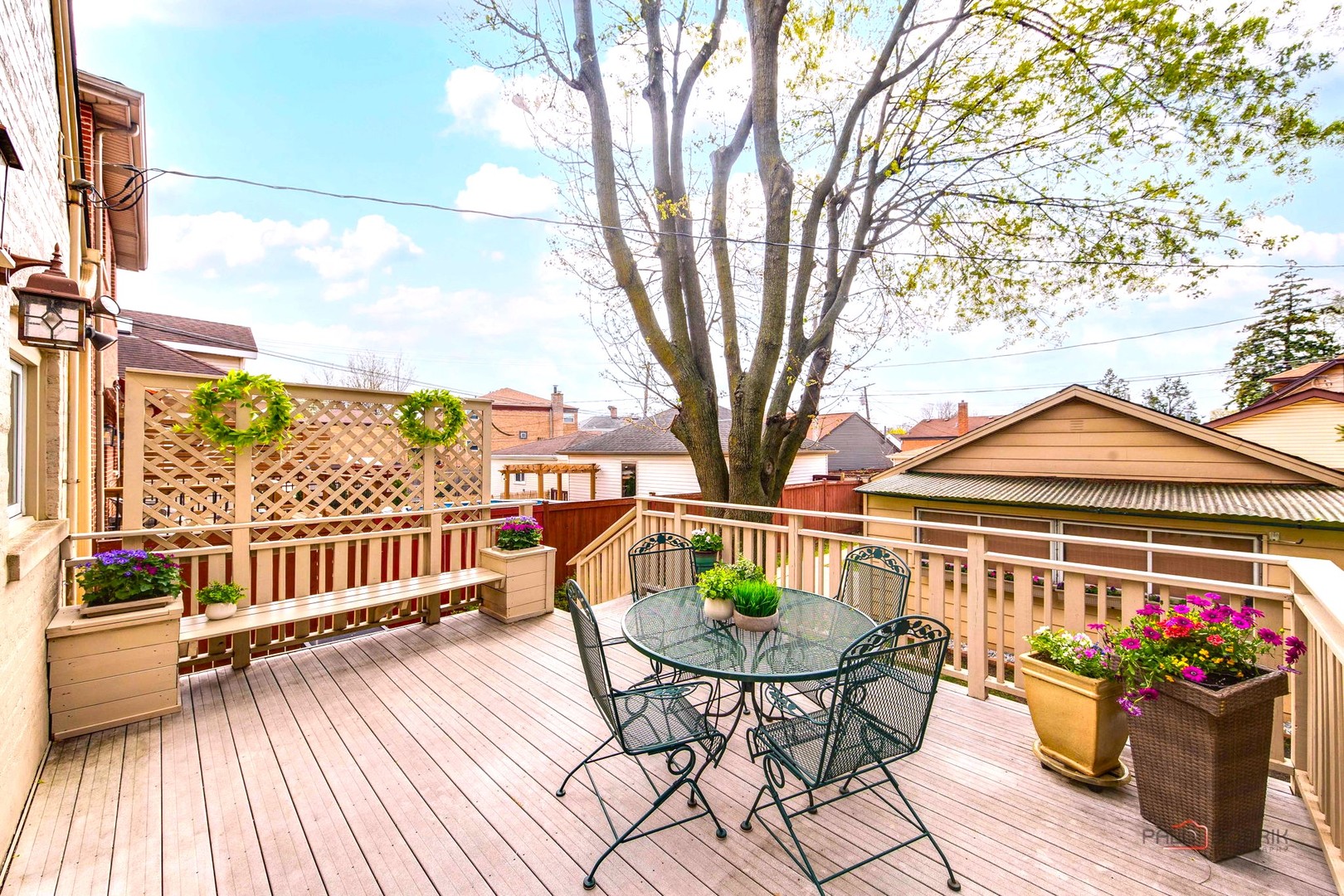 2720 Beulah Avenue River Grove, IL 60171 - Photo 13 of 33 a view of a chairs and table on the wooden deck