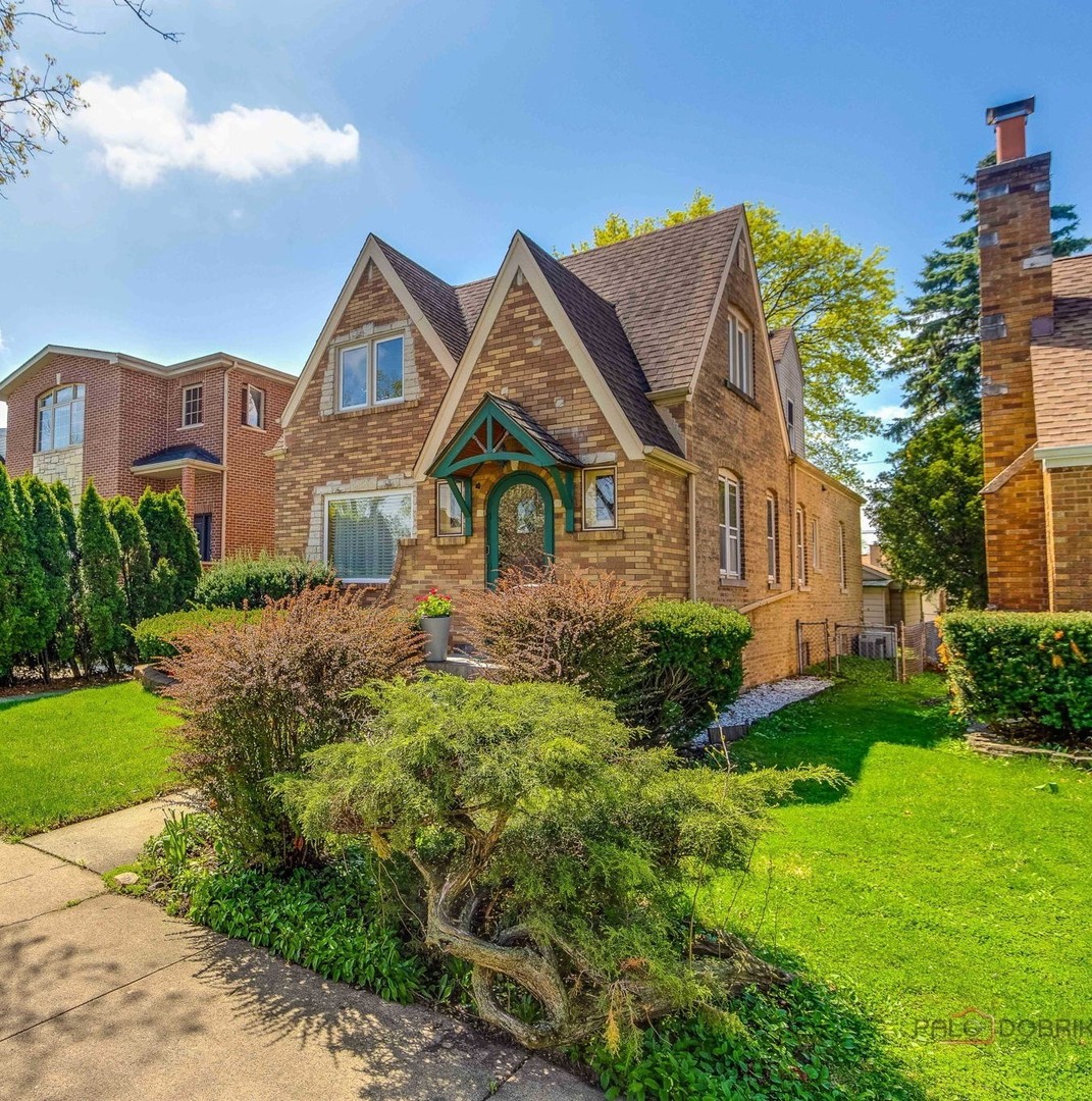 2720 Beulah Avenue River Grove, IL 60171 - Photo 2 of 33 a front view of a house with a yard