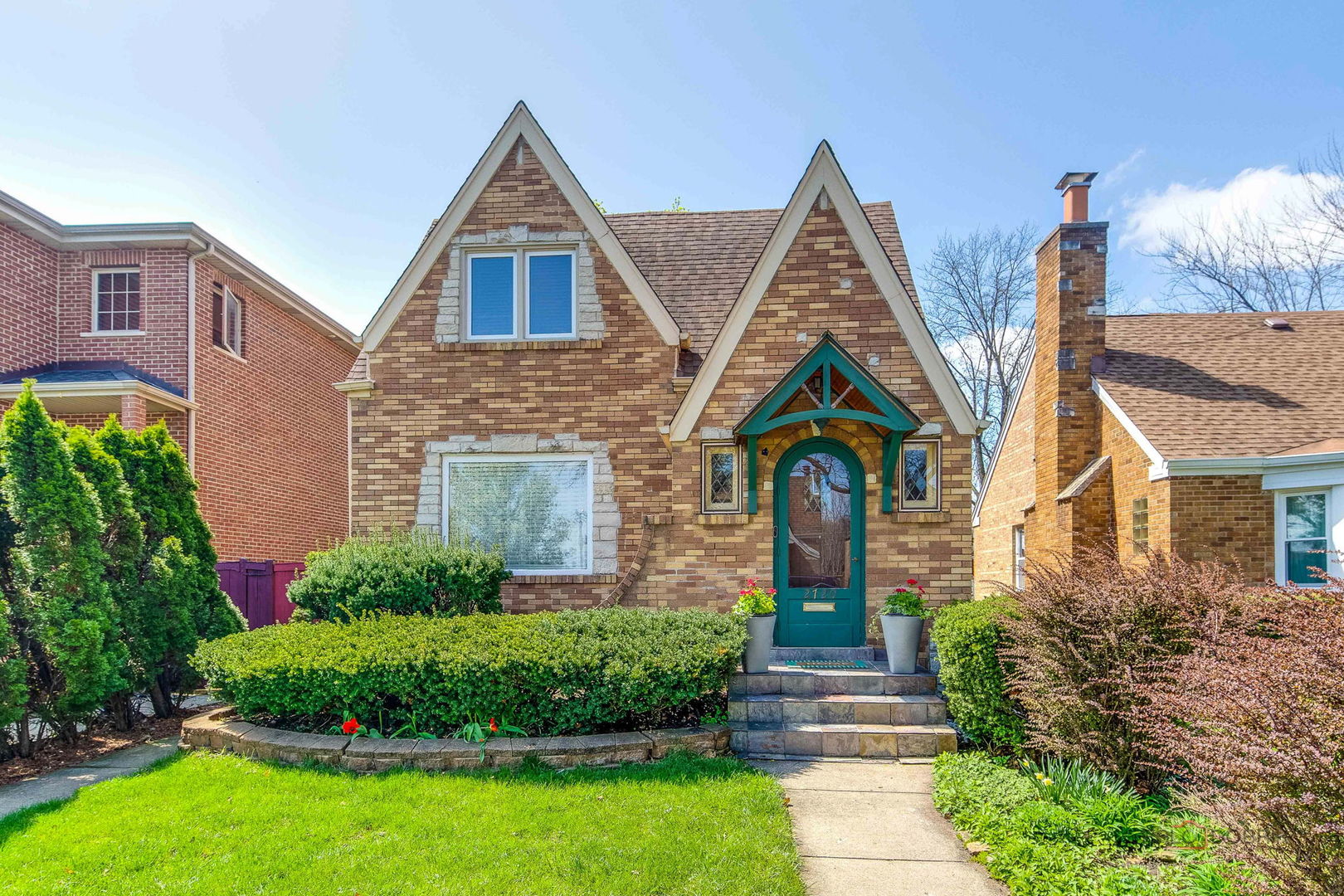 2720 Beulah Avenue River Grove, IL 60171 - Photo 3 of 33 a front view of a house with a yard and potted plants