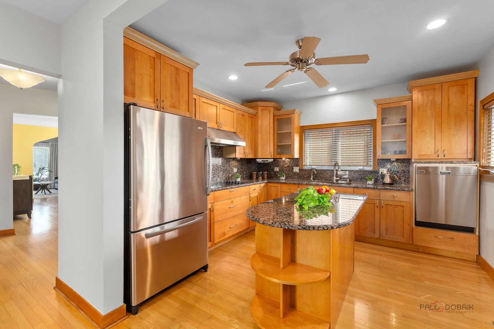 2720 Beulah Avenue River Grove, IL 60171 - Photo 8 of 33 a kitchen with stainless steel appliances granite countertop a refrigerator a oven a sink and a dining table with wooden floor
