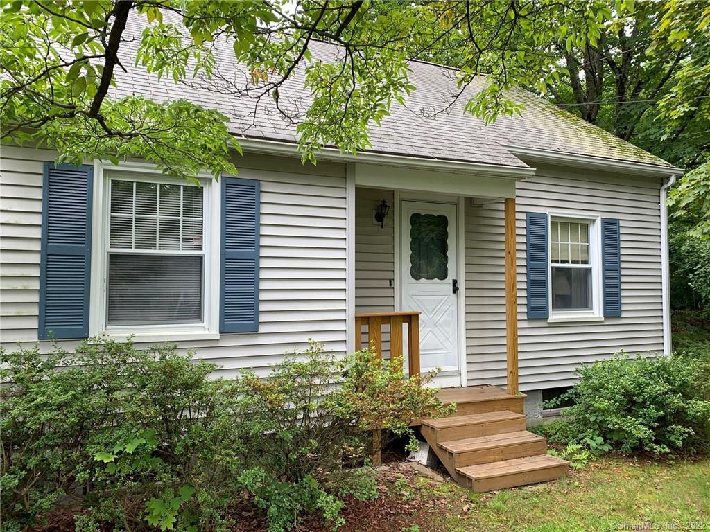 6 Shepard Road Danbury, CT 06810 - Photo 1 of 1 a front view of a house with a yard
