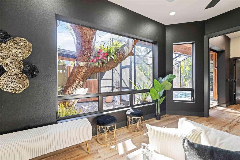 4534 Banan Place Siesta Key, FL 34242 - Photo 26 of 77 a living room with furniture and a large window