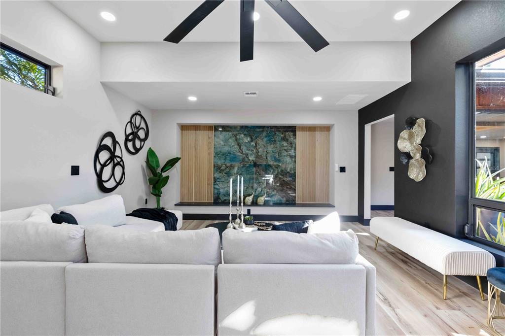 4534 Banan Place Siesta Key, FL 34242 - Photo 29 of 77 a living room with furniture and a large window