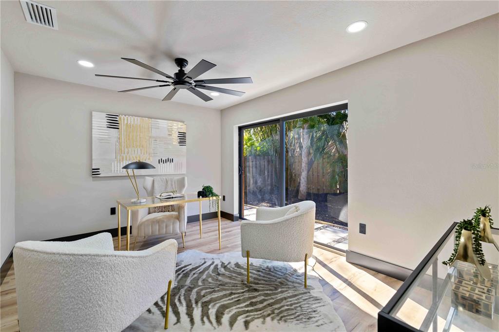 4534 Banan Place Siesta Key, FL 34242 - Photo 45 of 77 a living room with furniture