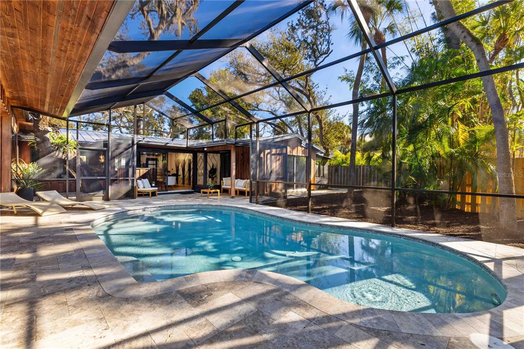 4534 Banan Place Siesta Key, FL 34242 - Photo 56 of 77 a view of a backyard with a patio
