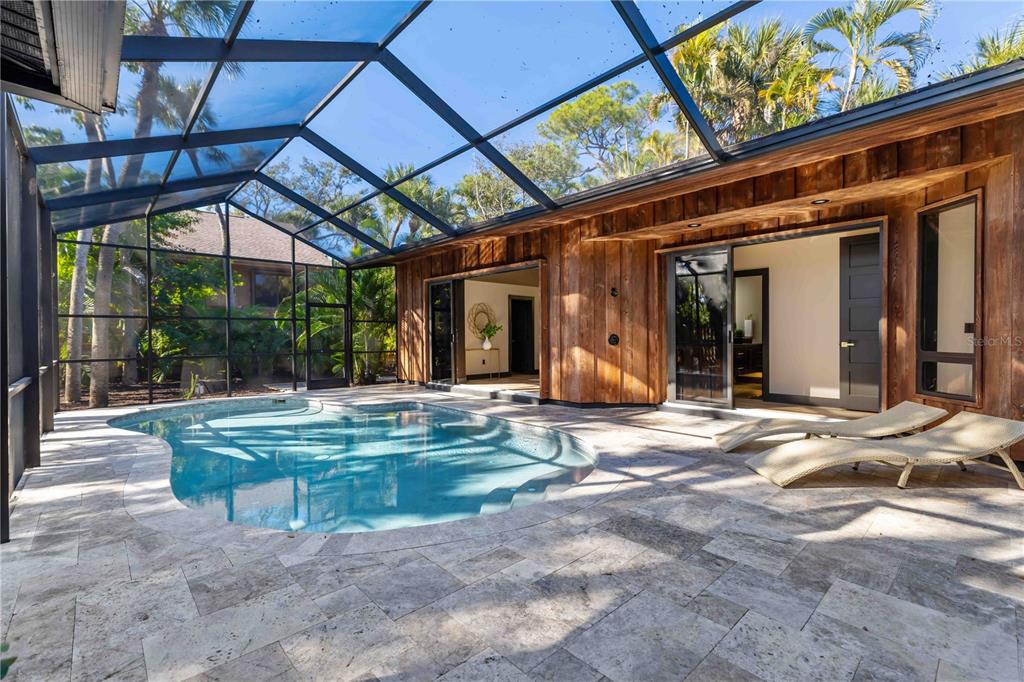 4534 Banan Place Siesta Key, FL 34242 - Photo 57 of 77 a view of a dinning room with a backyard of a house