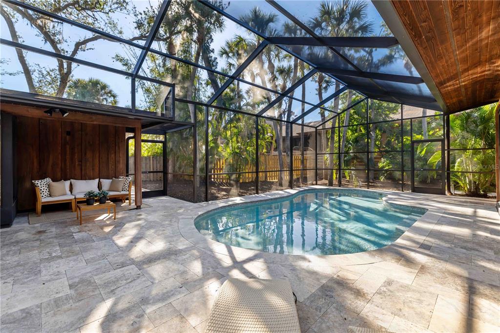 4534 Banan Place Siesta Key, FL 34242 - Photo 59 of 77 a view of a couches with wooden fence