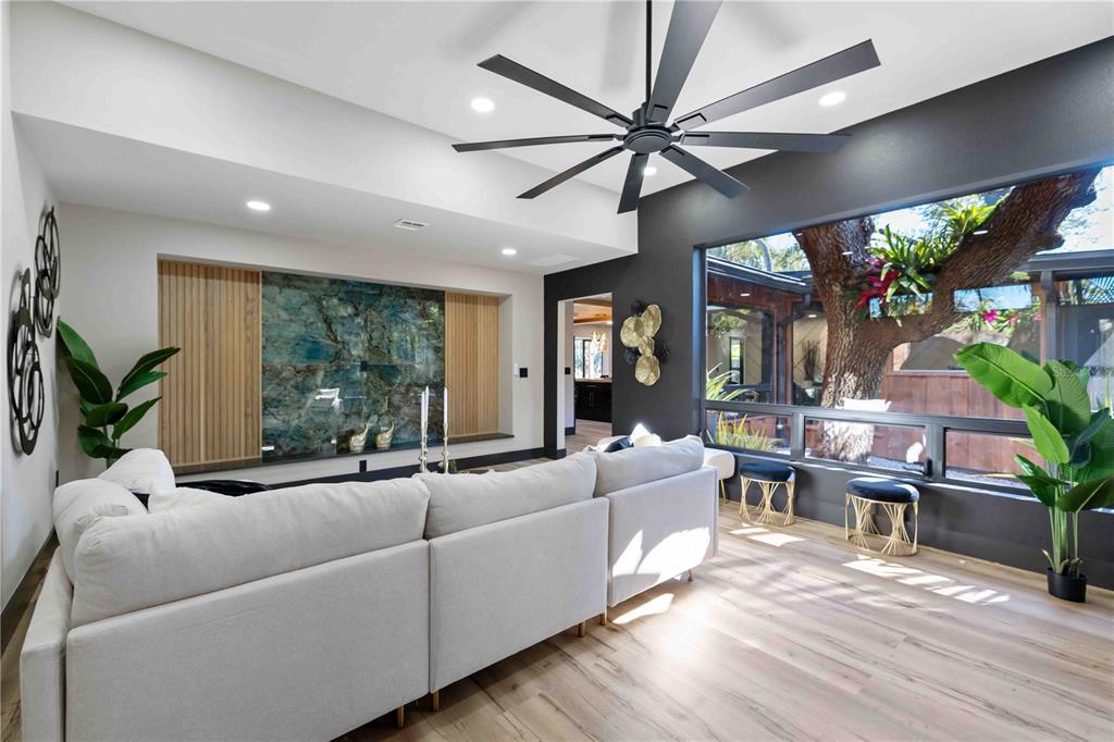 4534 Banan Place Siesta Key, FL 34242 - Photo 9 of 77 a living room with furniture and a large window