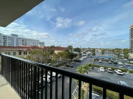 a view of a balcony with city view