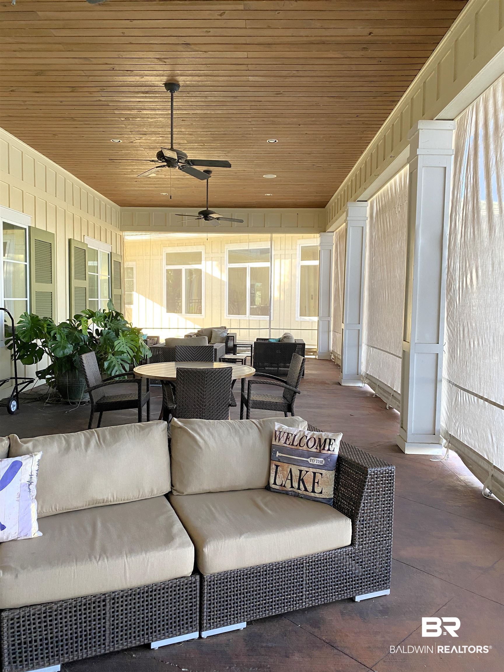 11869 Gateway Drive Elberta, AL 36530 - Photo 20 of 78 View of patio featuring an outdoor hangout area and ceiling fan