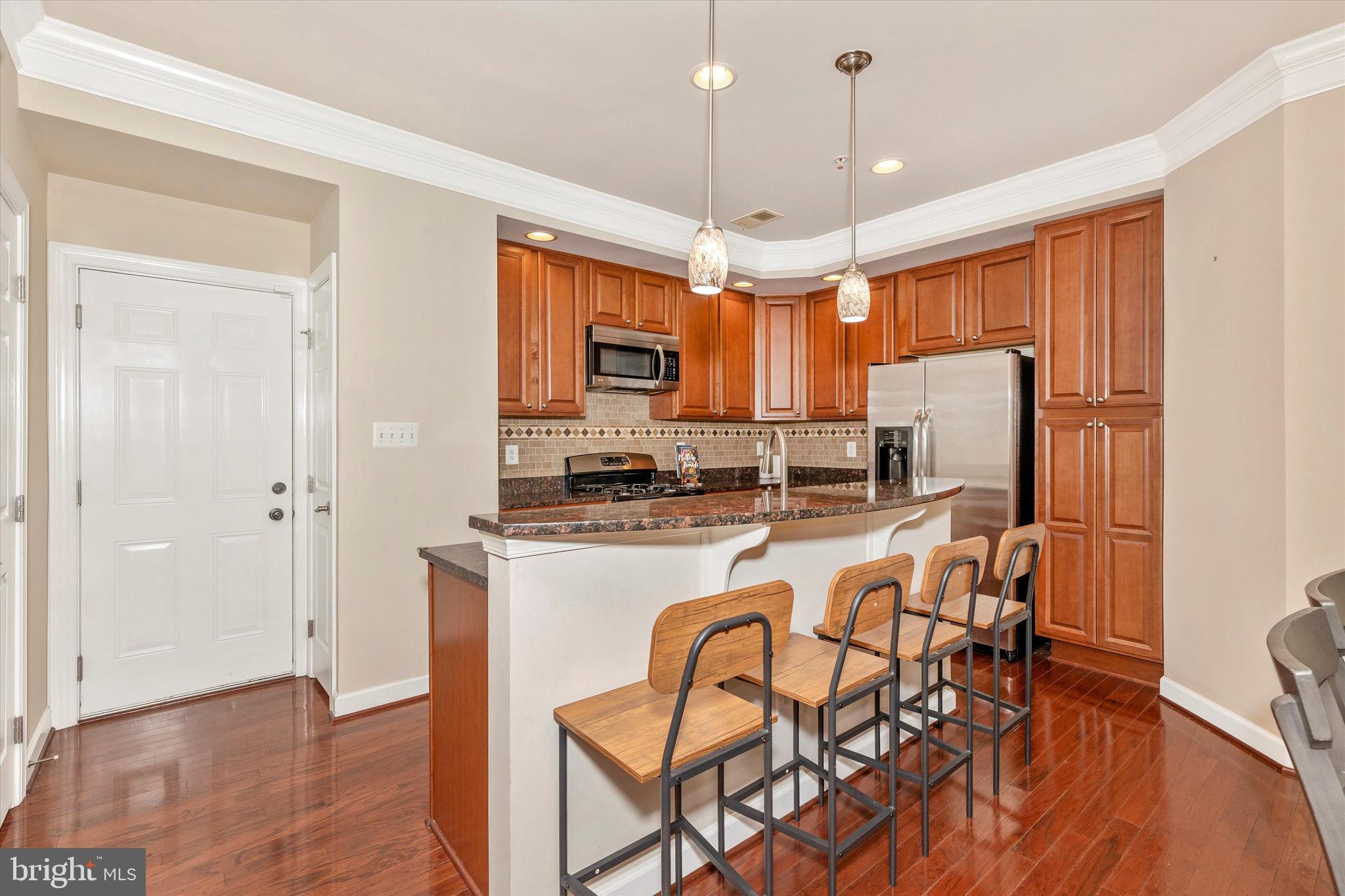 3616 Holborn Place Frederick, MD 21704 - Photo 10 of 56 Bar seating with pendant lighting