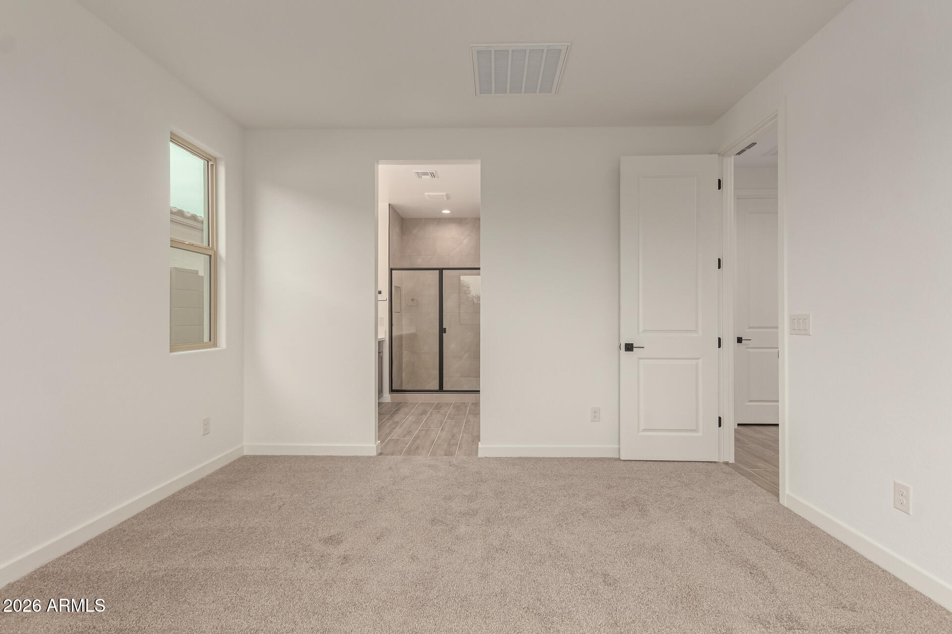 8030 West Granada Road Phoenix, AZ 85035 - Photo 11 of 36 a view of an empty room and window
