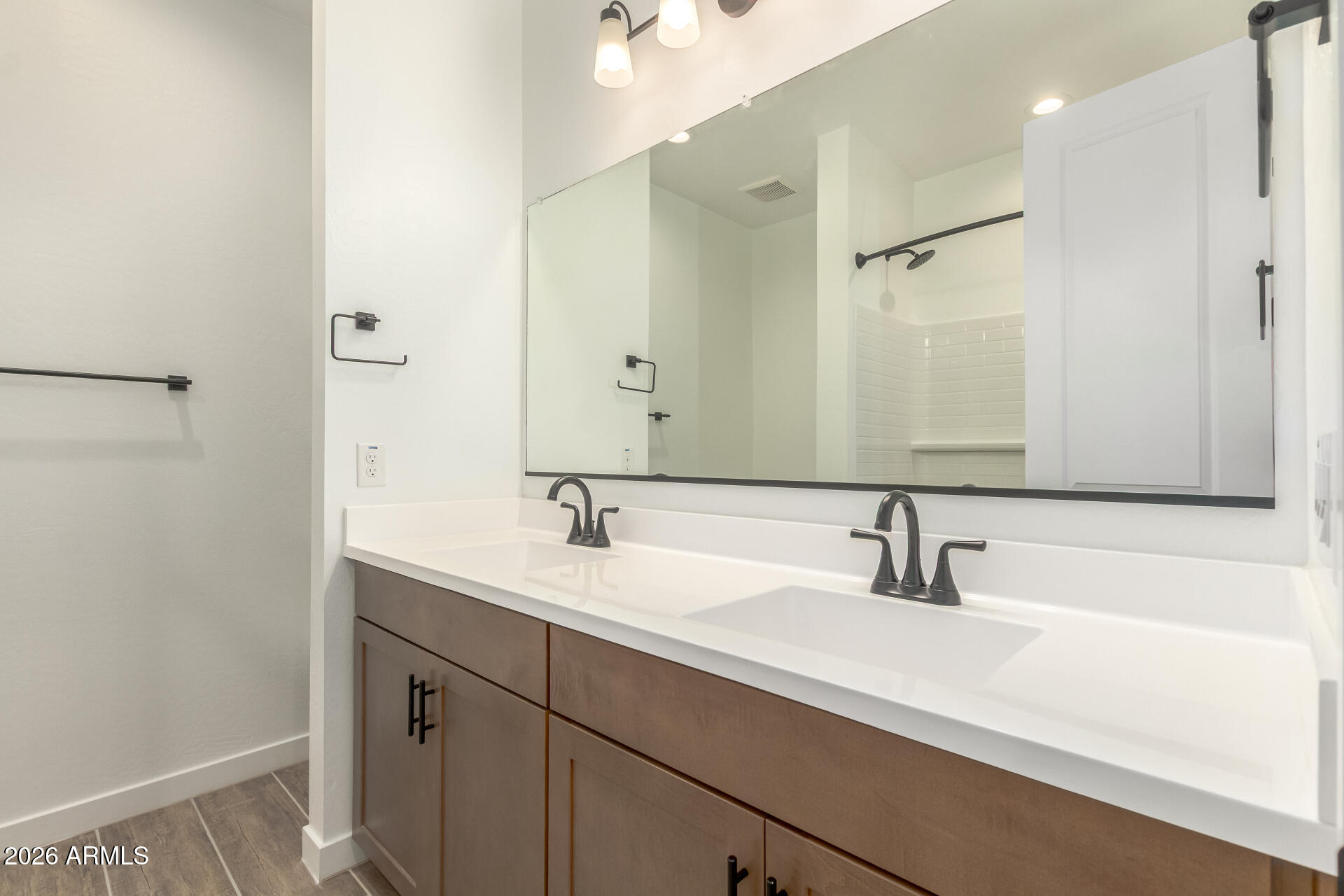 8030 West Granada Road Phoenix, AZ 85035 - Photo 22 of 36 a bathroom with a sink and a mirror