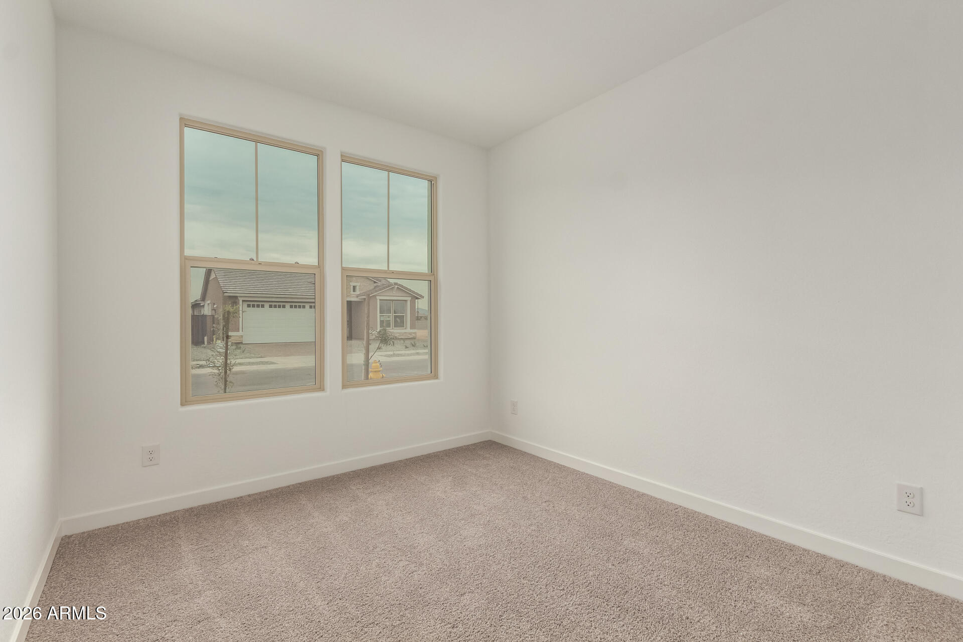 8030 West Granada Road Phoenix, AZ 85035 - Photo 24 of 36 an empty room with a window