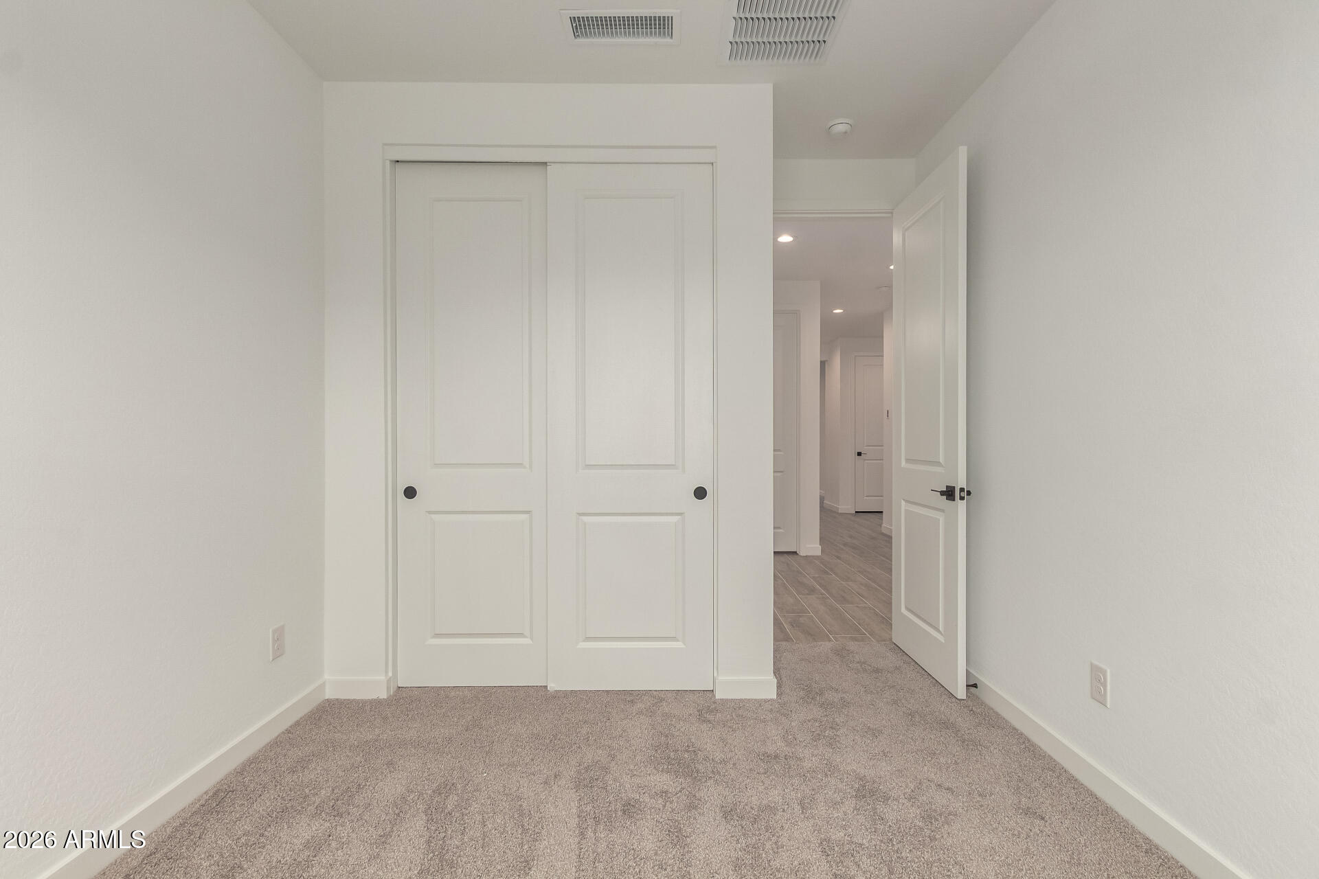 8030 West Granada Road Phoenix, AZ 85035 - Photo 26 of 36 an empty room with closet and a bathroom