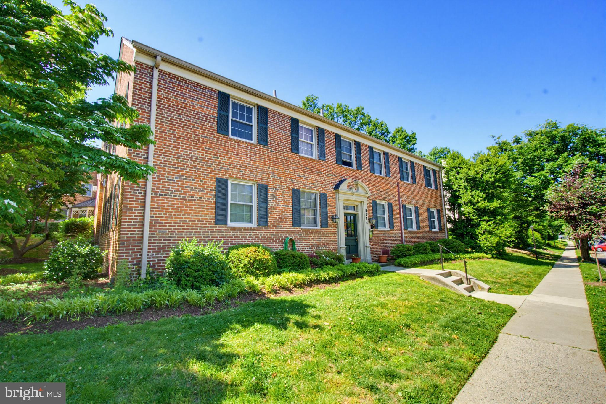 2214 Colston Drive, Unit 201 Silver Spring, MD 20910 - Photo 34 of 43 a front view of a house with garden