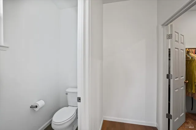 a en suite bathroom with a double vanity sink a mirror and shower