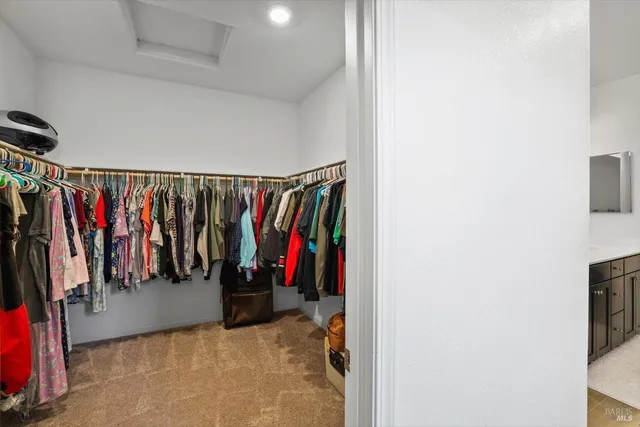 a view of a storage & utility room with wooden floor