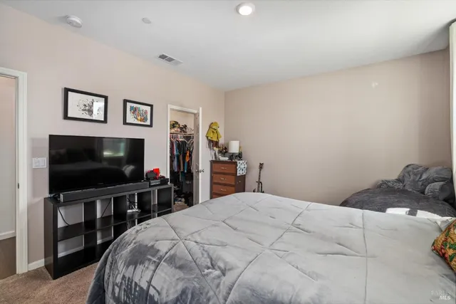 a living room with furniture and toys