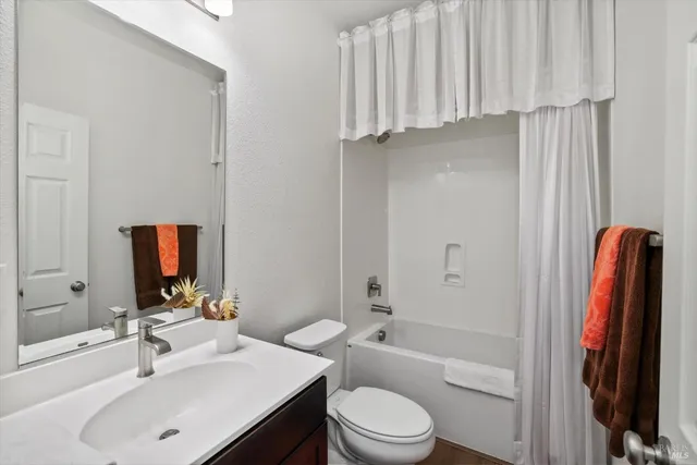 a building outdoor space with patio furniture and potted plants