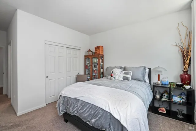 a view of a pathway with a backyard