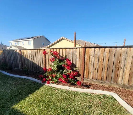 a front view of a house with a garage