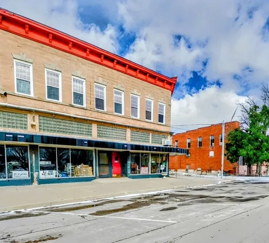 a front view of a building with street