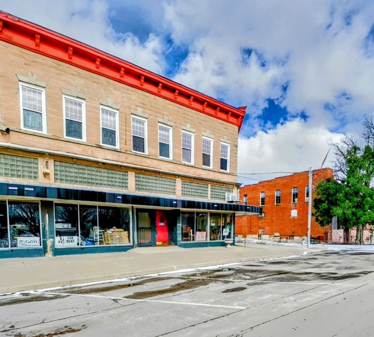a front view of a building with street