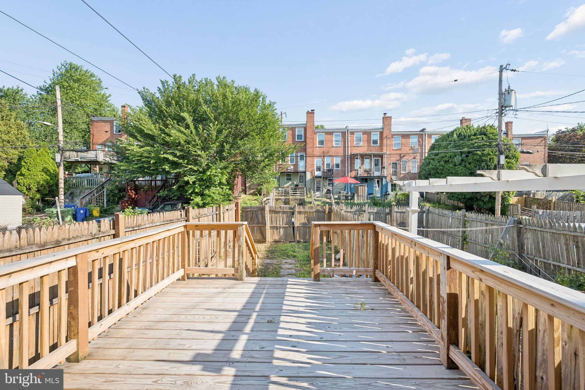 3548 Benzinger Road Baltimore, MD 21229 - Photo 38 of 40 a view of a balcony with wooden floor