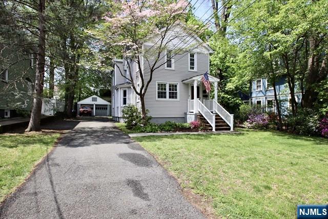323 Maple Avenue, Unit 2 Oradell, NJ 07649 - Photo 1 of 8 a front view of a house with garden