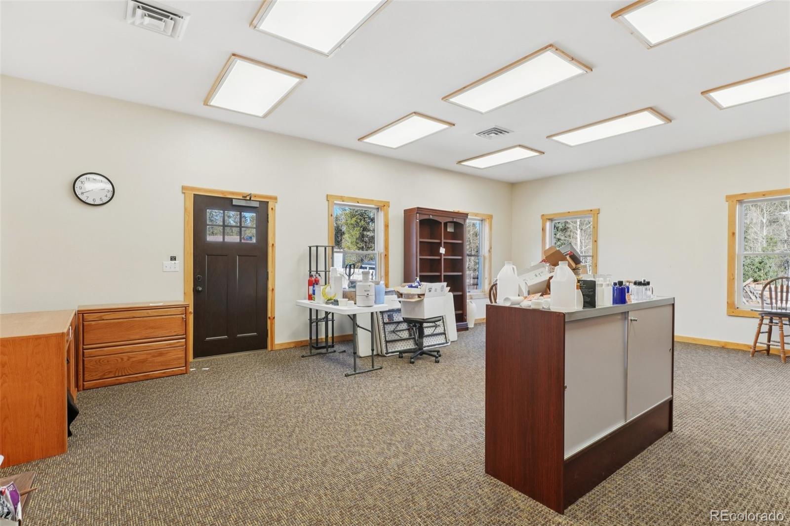4628 Smith Hill Road Golden, CO 80403 - Photo 15 of 49 a living room with furniture and a window