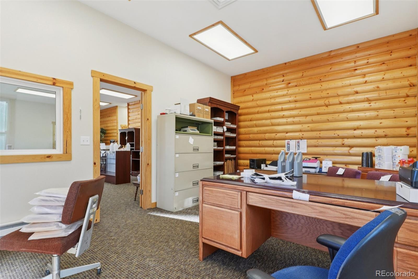 4628 Smith Hill Road Golden, CO 80403 - Photo 19 of 49 a room with furniture and window