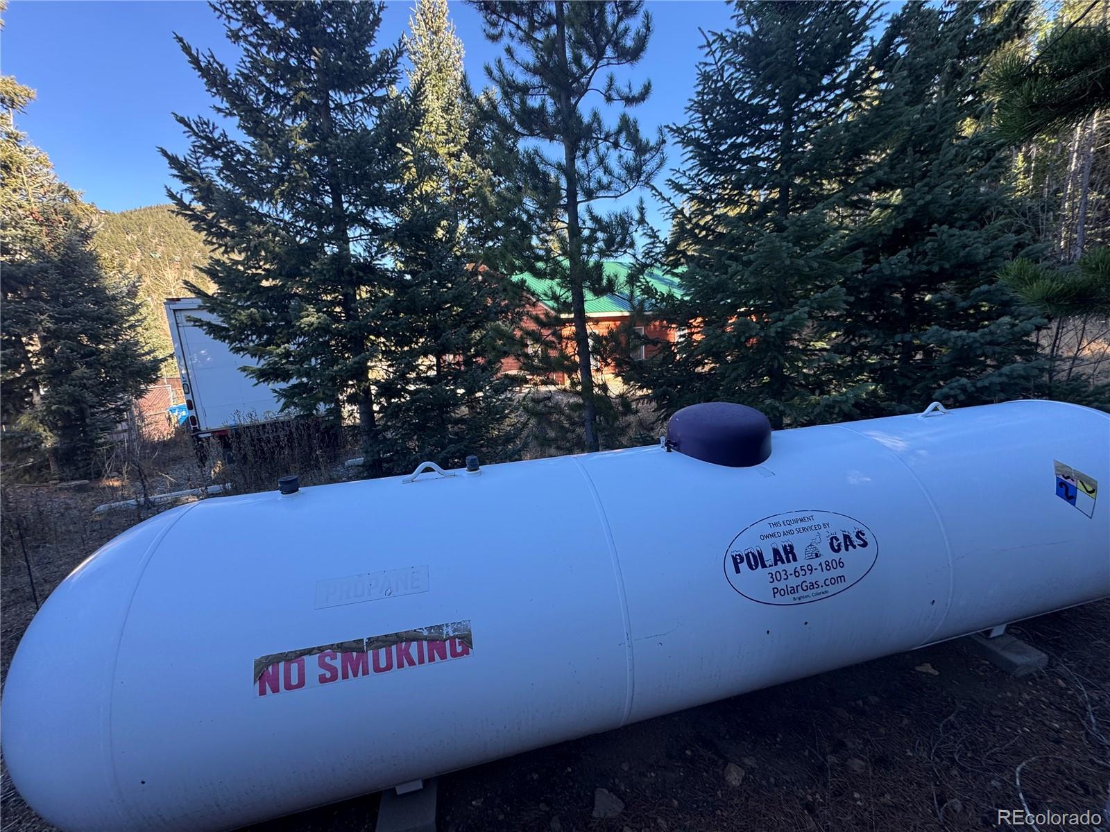 4628 Smith Hill Road Golden, CO 80403 - Photo 22 of 49 a view of outdoor space with a tree