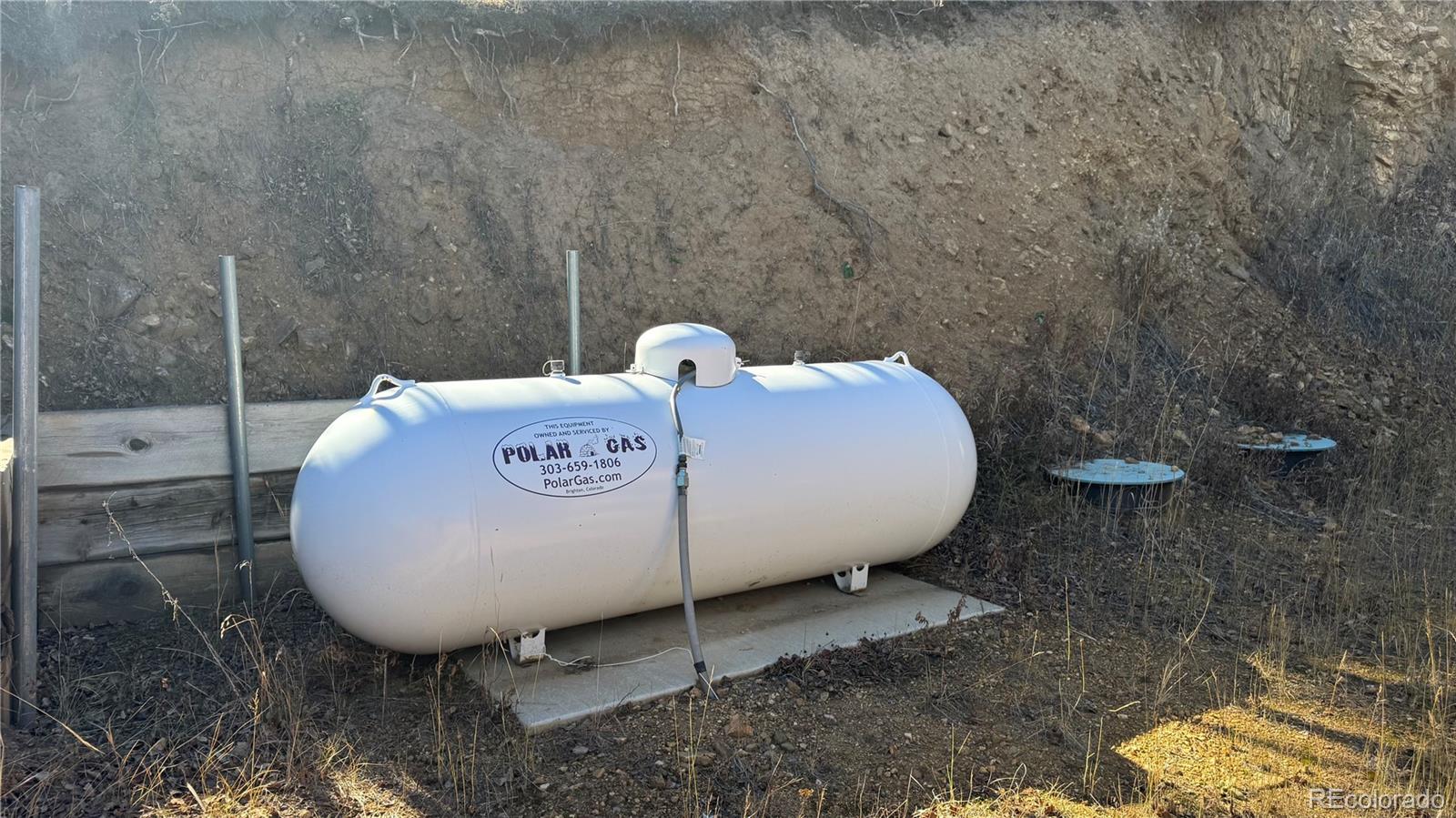 4628 Smith Hill Road Golden, CO 80403 - Photo 28 of 49 a view of a backyard with table and chairs
