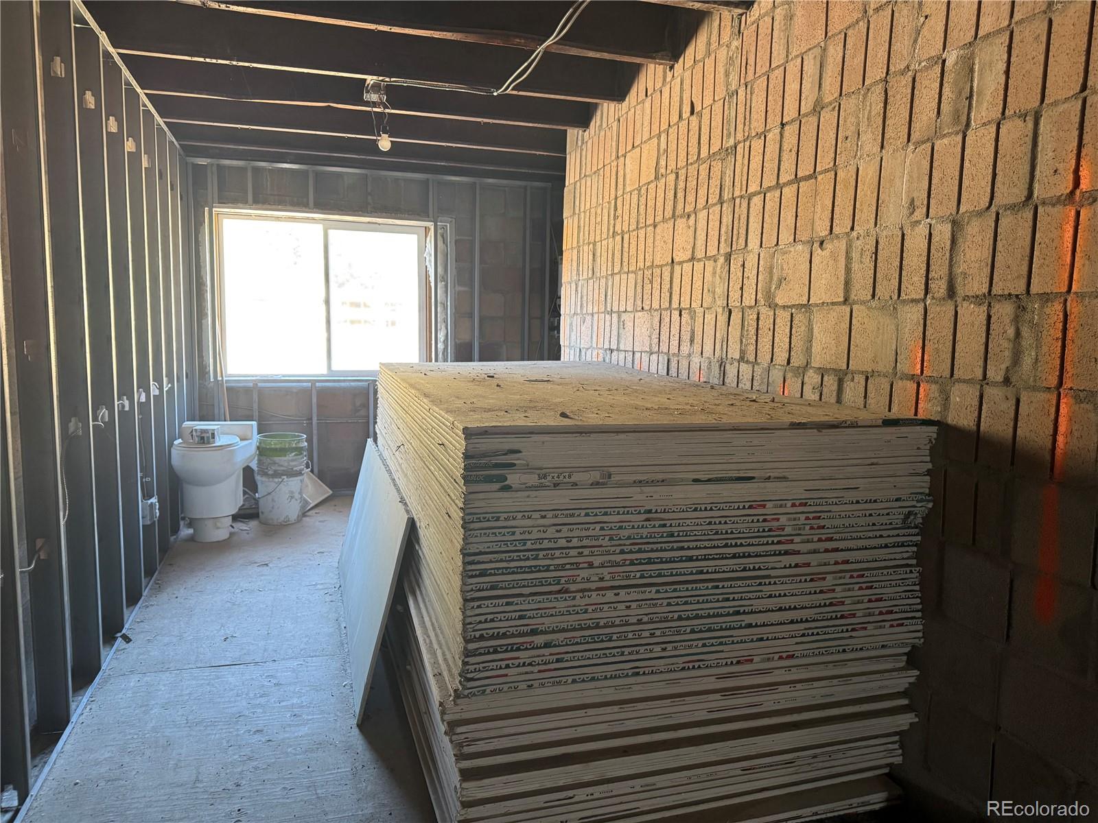 4628 Smith Hill Road Golden, CO 80403 - Photo 42 of 49 a bathroom with a sink and a toilet