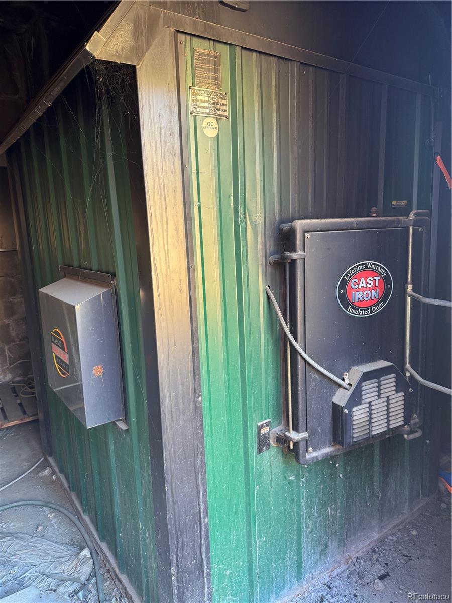 4628 Smith Hill Road Golden, CO 80403 - Photo 44 of 49 a view of an entryway with a wooden floor