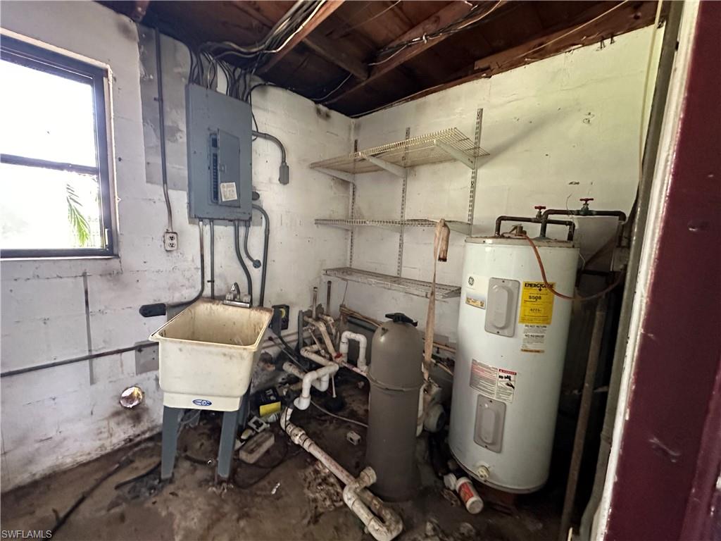 1132 Donald Road North Fort Myers, FL 33917 - Photo 11 of 21 a utility room with dryer and washer