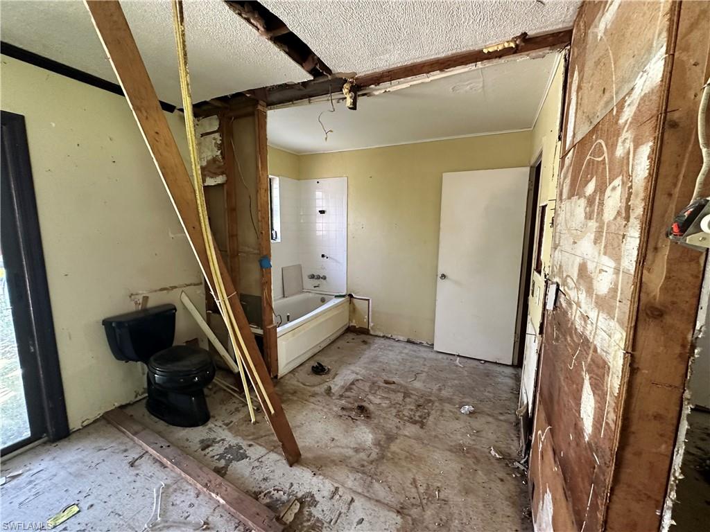 1132 Donald Road North Fort Myers, FL 33917 - Photo 17 of 21 a view of an entryway with a door