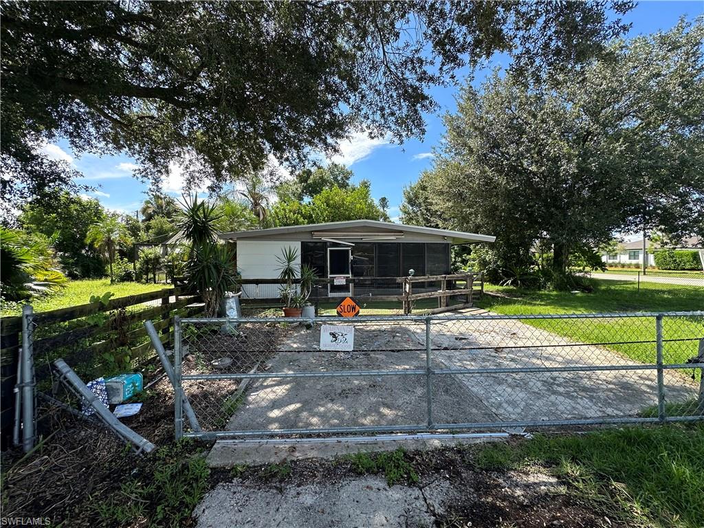 1132 Donald Road North Fort Myers, FL 33917 - Photo 2 of 21 a view of a house with backyard porch and sitting area