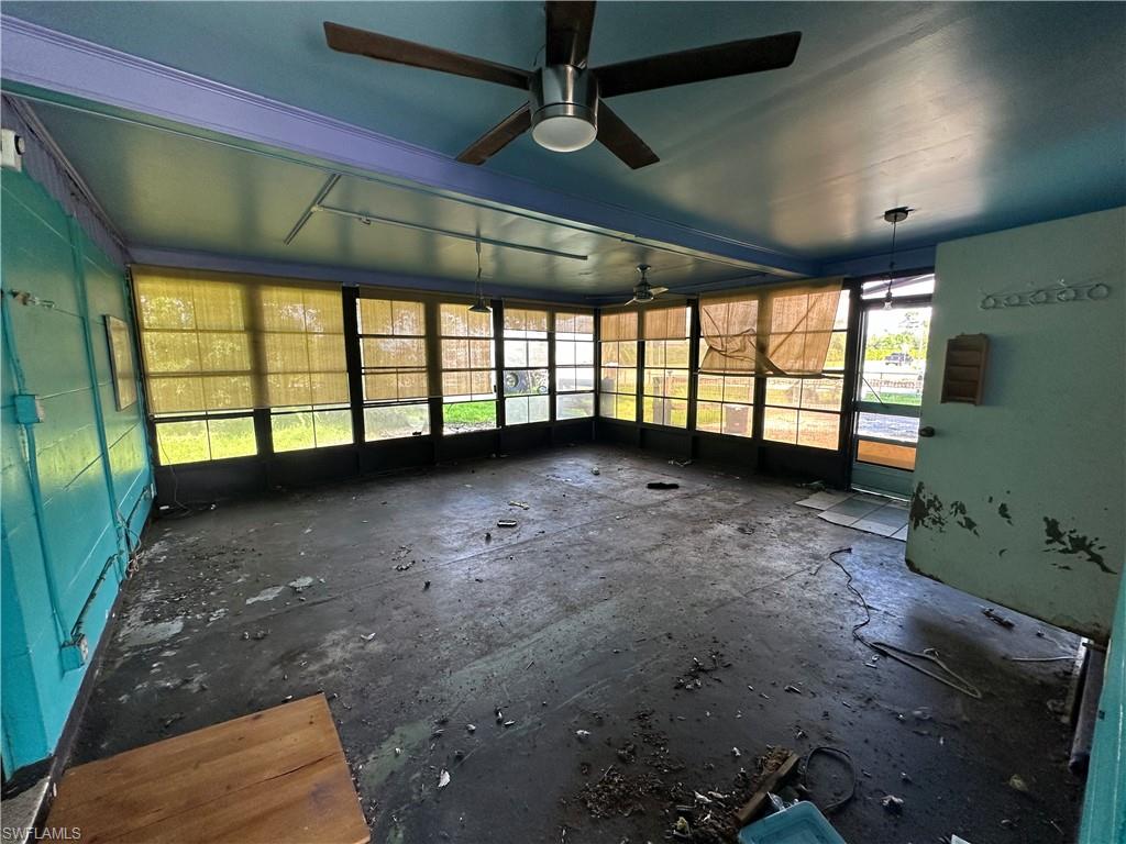 1132 Donald Road North Fort Myers, FL 33917 - Photo 9 of 21 a view of an empty room with a window