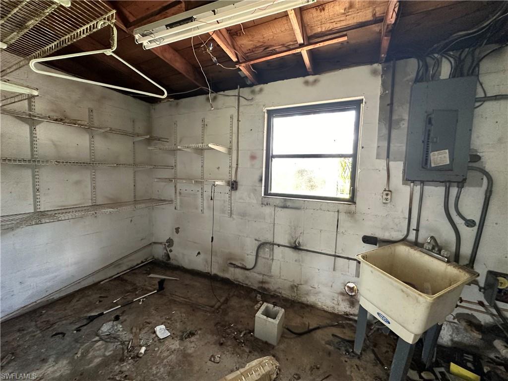 1132 Donald Road North Fort Myers, FL 33917 - Photo 10 of 21 a bathroom with a granite countertop sink and a mirror