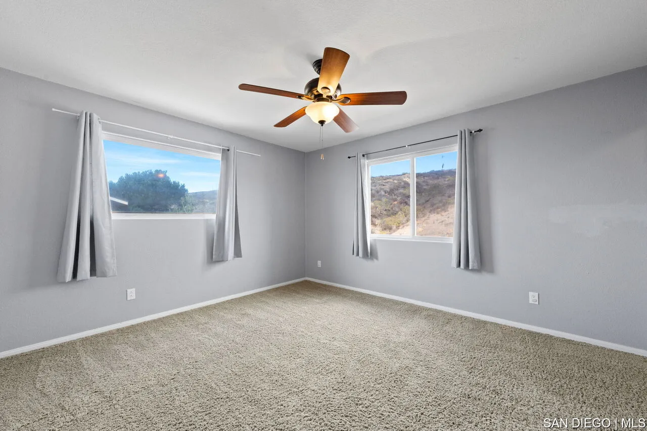 9648 Eucalyptus Street Spring Valley, CA 91977 - Photo 19 of 39 a view of an empty room with a window