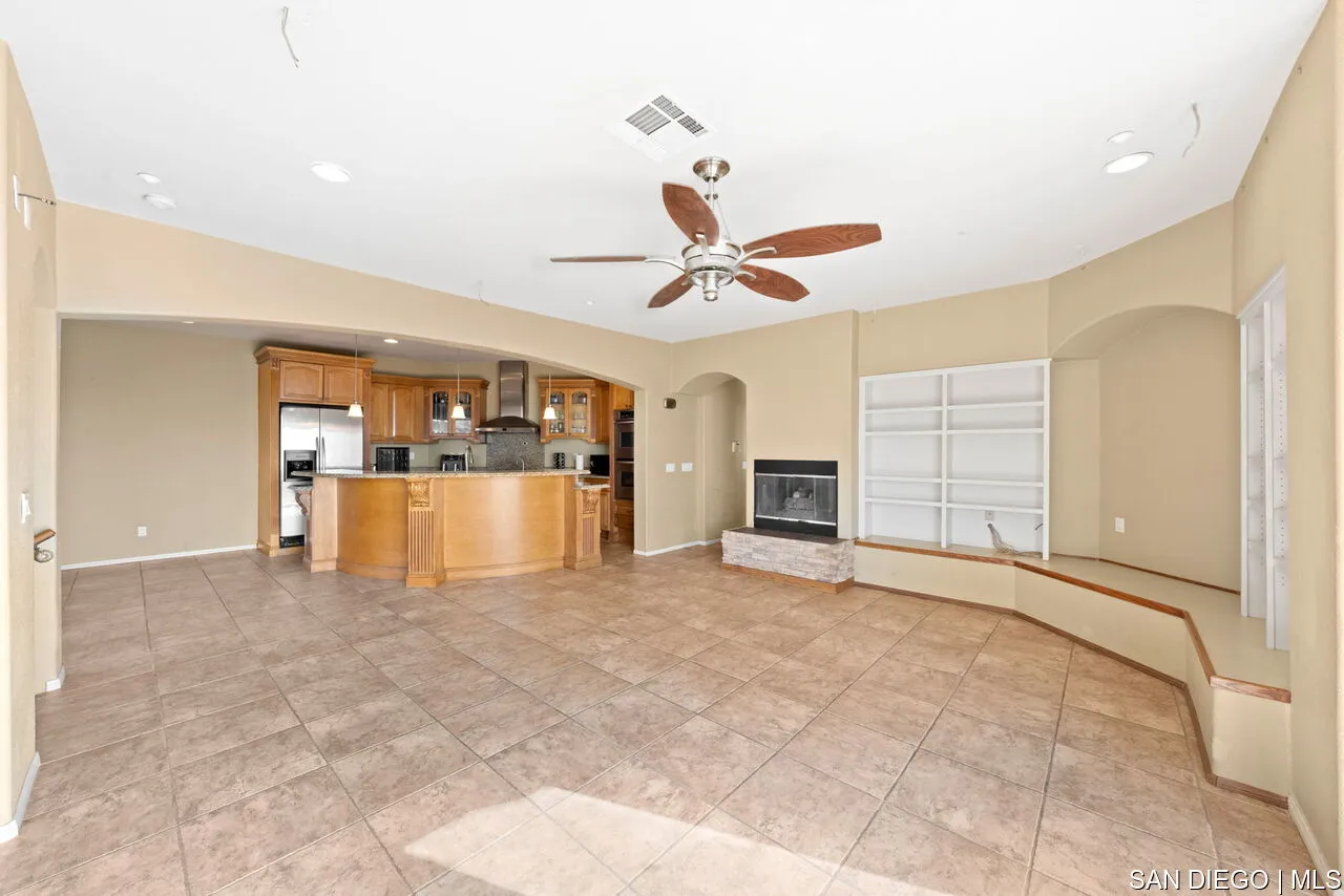 9648 Eucalyptus Street Spring Valley, CA 91977 - Photo 9 of 39 a view of a livingroom with a kitchen and a window
