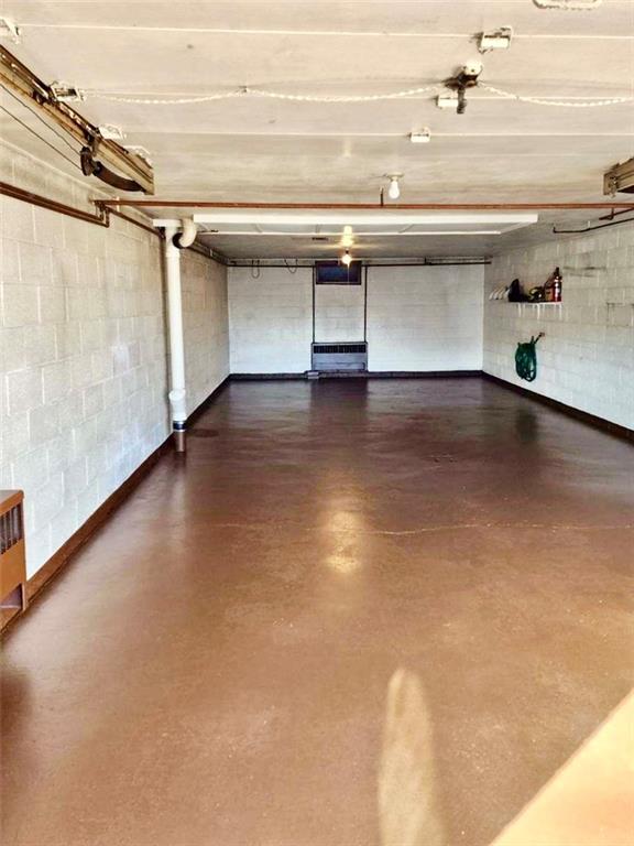 830 Ridge Avenue McKees Rocks, PA 15136 - Photo 45 of 50 Shot of two car deep single door integral garage. New paint on floor!