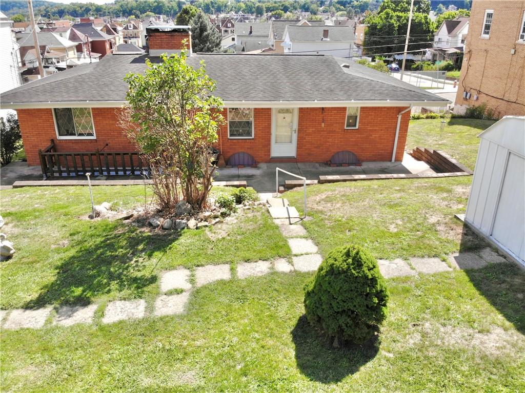 830 Ridge Avenue McKees Rocks, PA 15136 - Photo 48 of 50 Rear patio Area with Exterior Steps down to Basement